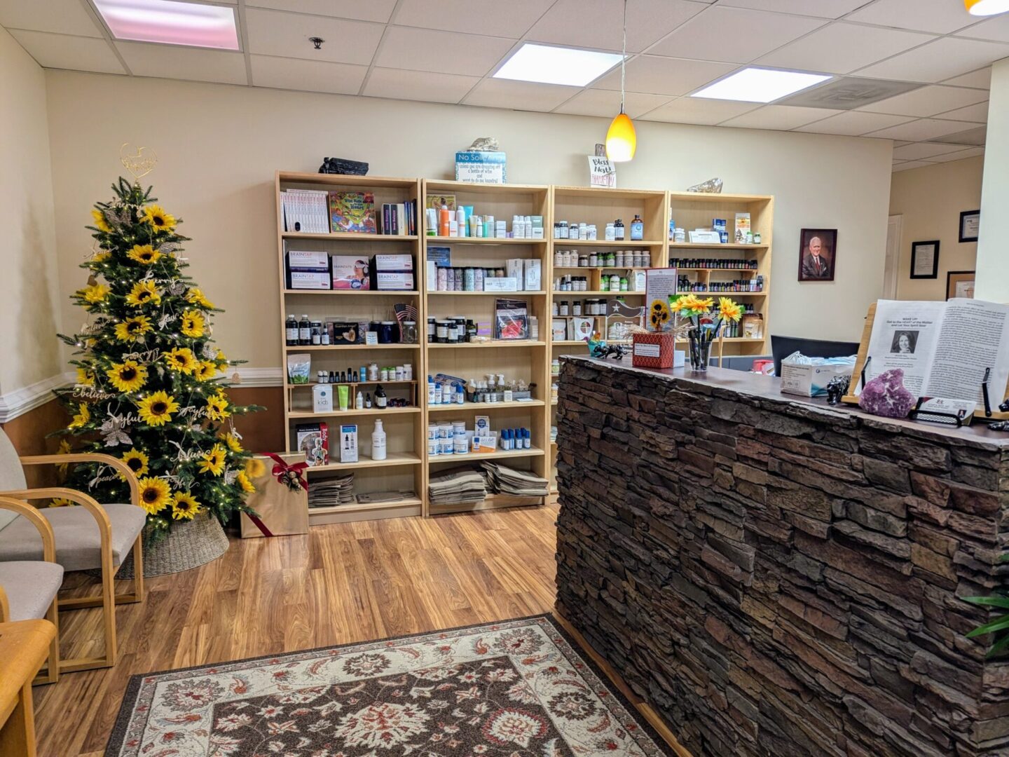 A room with shelves and a tree in the middle